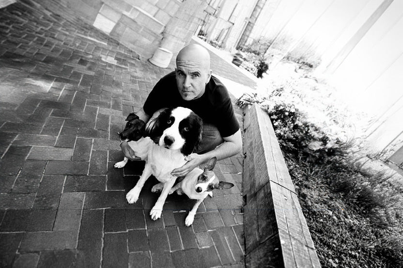 Michael, founder of WACKYwalk'r, with the dogs that started it all